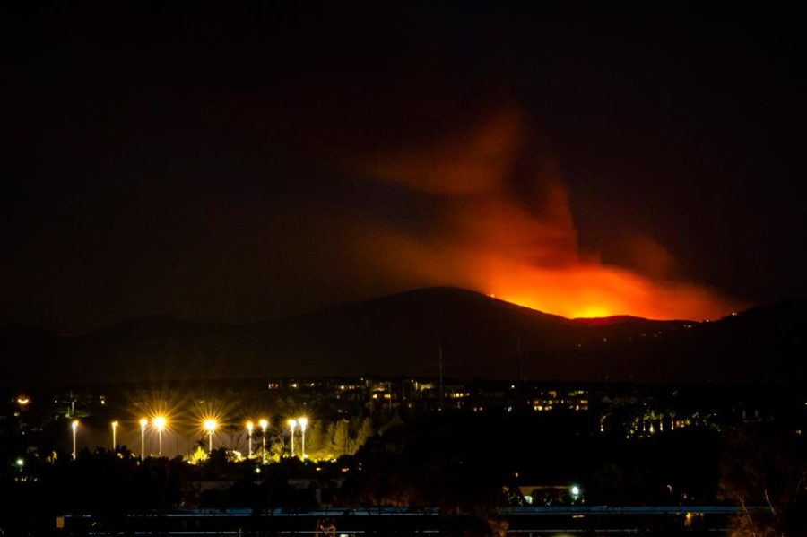 The Rancho Bernardo Fire, seen from the northeast end of Warren College on Wednesday night. The fire reached 1,600 acres and was 50 percent contained as of Wednesday night, according to KPBS. Photo by Alwin Szeto.