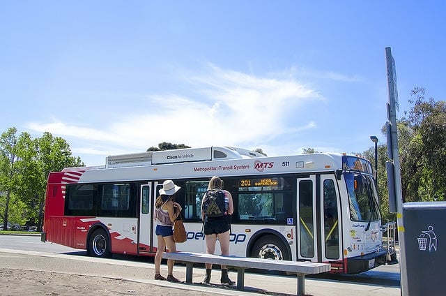 Students wait for a MTS Bus at Gilman and Myers bus stop. Photo by Michelle Louie/GUARDIAN