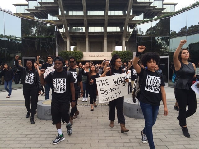 MARCHING ON:  Students demonstrate on Friday Dec. 5 as a part of a Black Student Union-led protest anti-black violent incidents in recent weeks. Photo by Meryl Press/Guardian