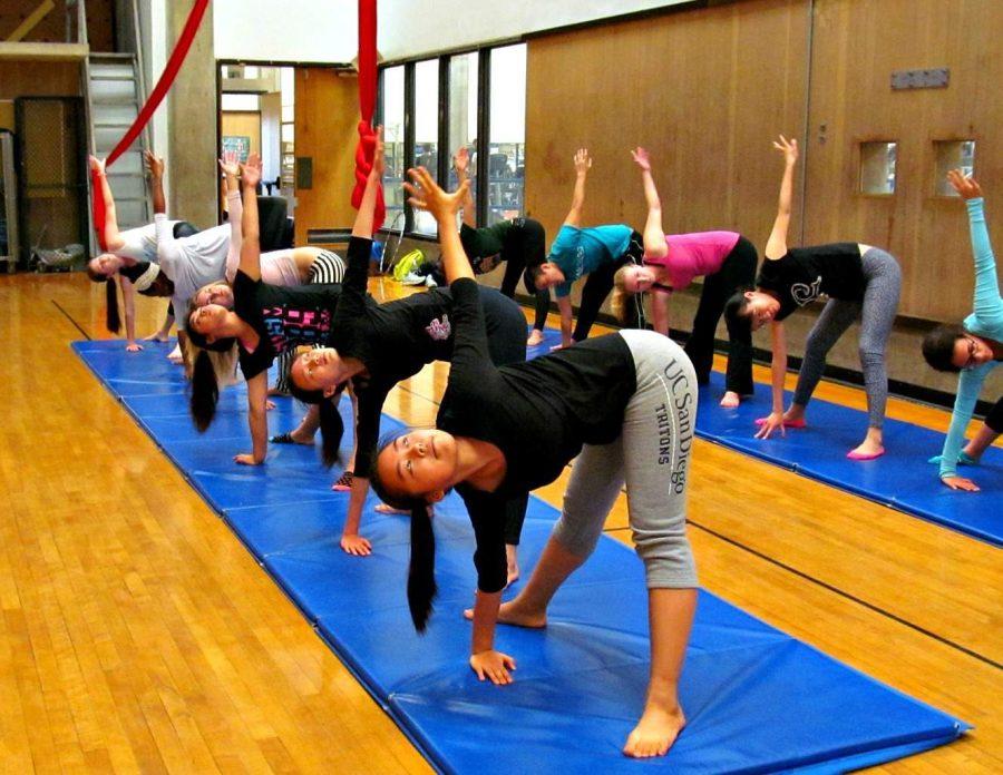 Students stretch before class. Photo credit by Thiba Thiagarajan.