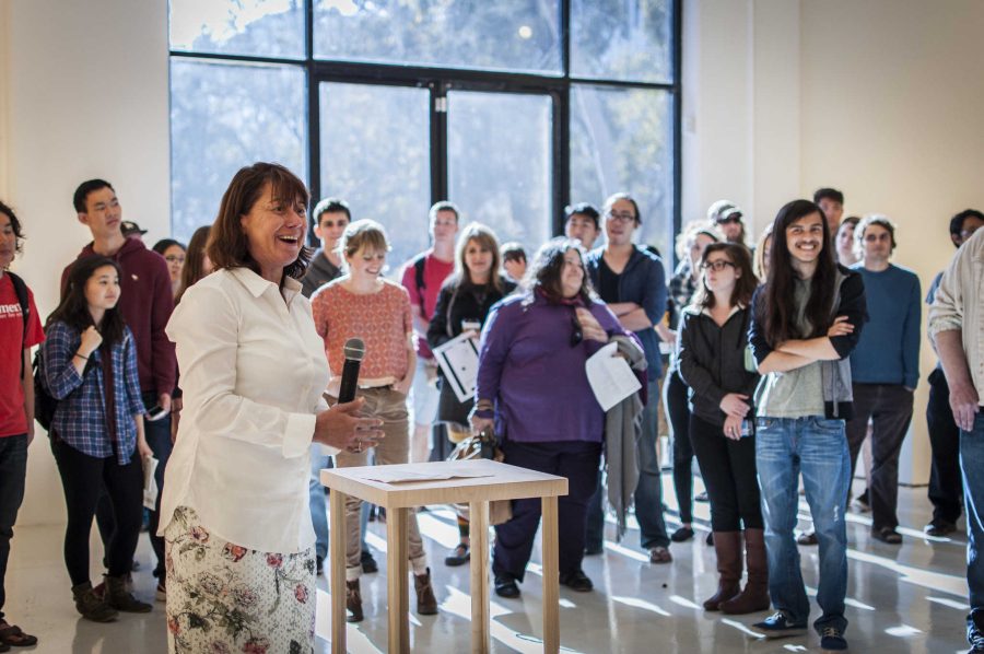 Dean of Arts and Humanities Cristina Della Colletta addresses students during the Round But Square exhibit opening reception last Wednesday. Photo by Siddharth Atre/Guardian.