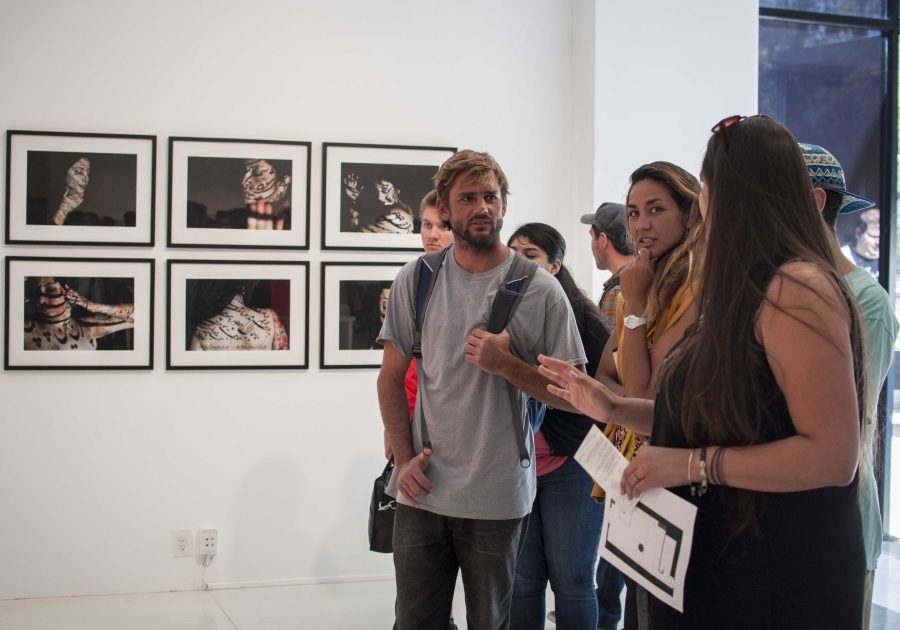 Students admire the University Art Gallery. Photo by Siddharth Atre