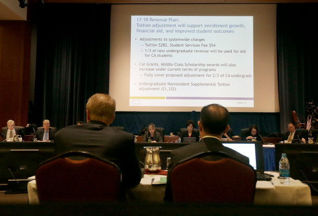 The University of California Board of Regents listen as a budget is proposed at a meeting in San Francisco, Thursday, Jan. 26, 2017. The university systems Board of Regents voted Thursday for a plan to increase tuition by 2.5 percent a year, its first tuition increase in seven years. (AP Photo/Jeff Chiu)