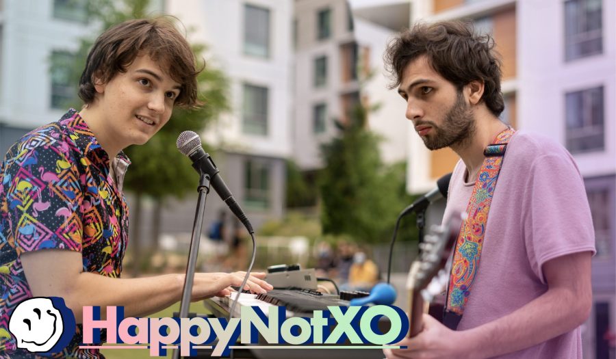 Pictured left to right: Frontmen of “HappynoT” Cameron Thomas and Karim Moussa perform at the band’s Weekly Open-Mic at Sixth College. Photo Credit to Alexander Olsen (@alexanderthefriendly) and UCSD Guardian.