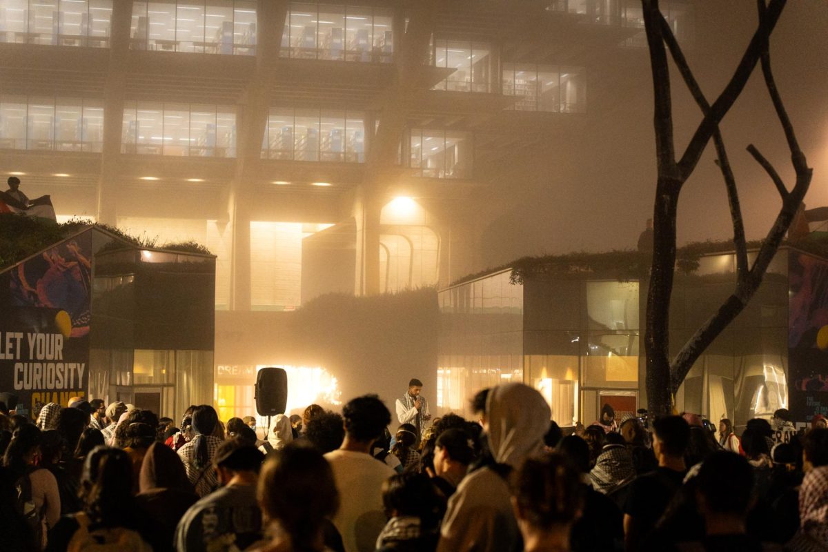 Students and Community Gather for Vigil in Anniversary of Year-long War on Gaza