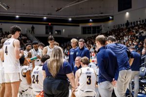 Men’s basketball knocks off undefeated Utah State in historic upset