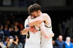 Men’s basketball’s fairytale season ends in heartbreaking loss to Michigan